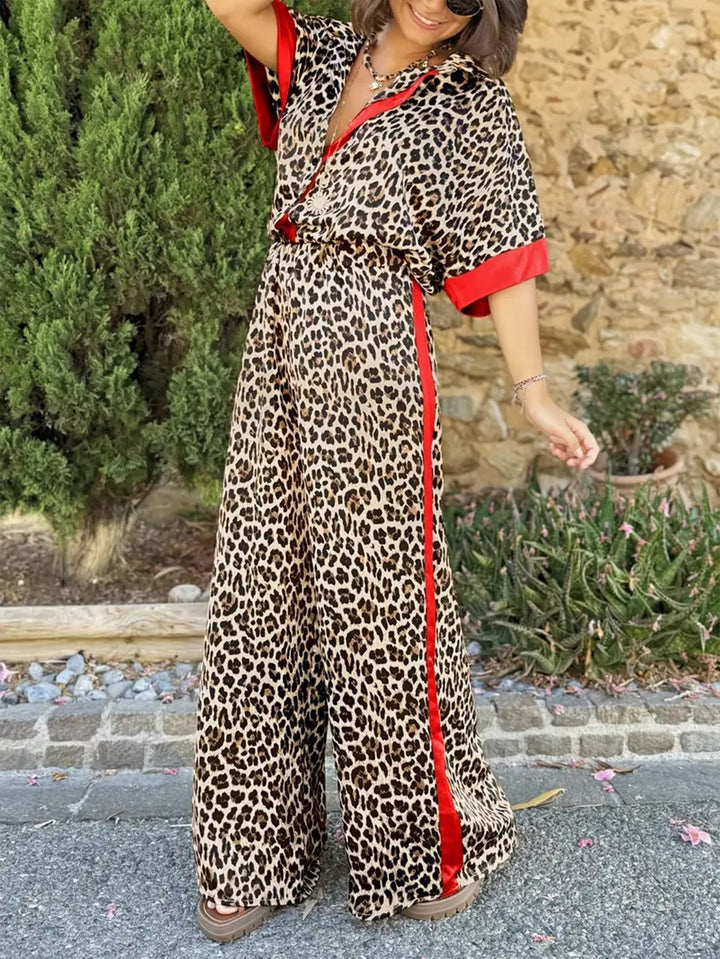 Stylish women's collared top & wide-leg trousers two-piece set. Versatile business casual outfit.