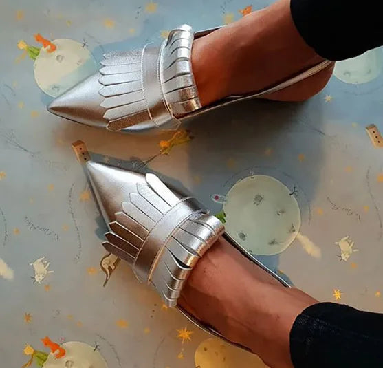 Stylish open-back high heels for women, featuring a sharp pointed toe & comfortable design.