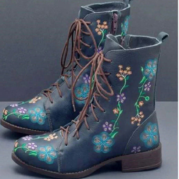 Retro women's ankle boots with vibrant ethnic embroidery, comfortable & stylish for everyday fall & winter outfits.