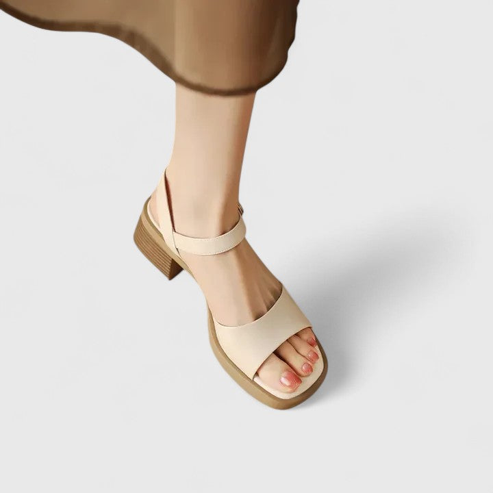 Fashionable women's elegant strappy sandals, comfortable and chic, with a modern square toe for summer.