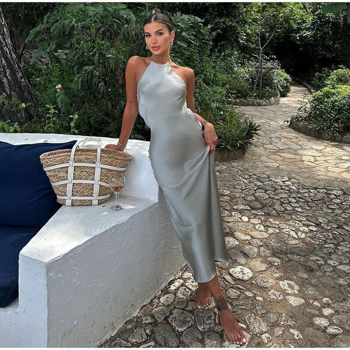 Elegant women's open-back maxi dress, ideal for wedding guests & special occasion formal wear.