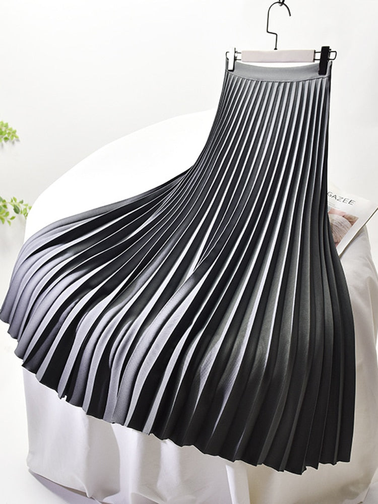 Textured pleated high-waist A-line skirt for women, offering an elegant and chic fashion statement.