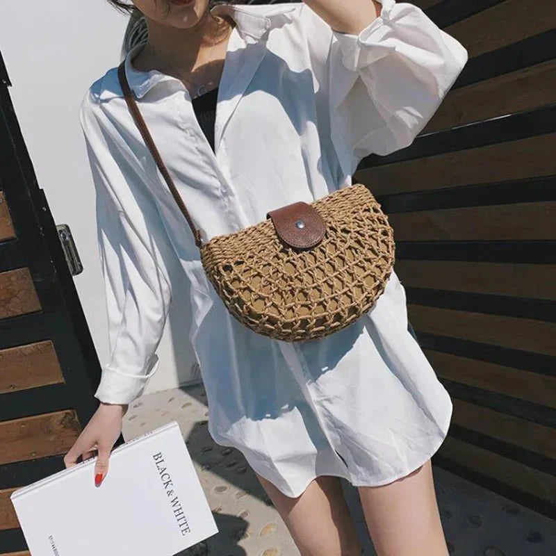 Braided straw shoulder bag for women, featuring a distinctive web design, in a natural beige tone.