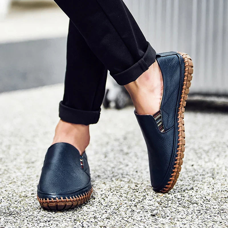 Stylish men's blue slip-on shoes, perfect for versatile casual wear and all-day comfort.