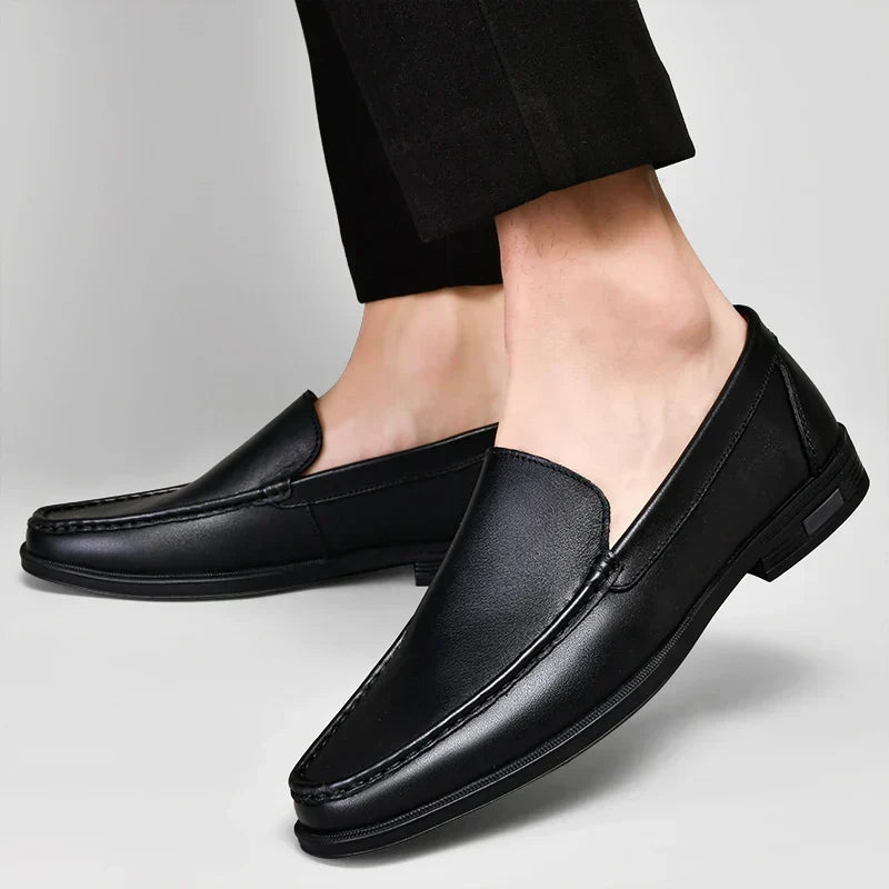 Effortless comfort: men's classic black slip-on loafers for refined fashion.