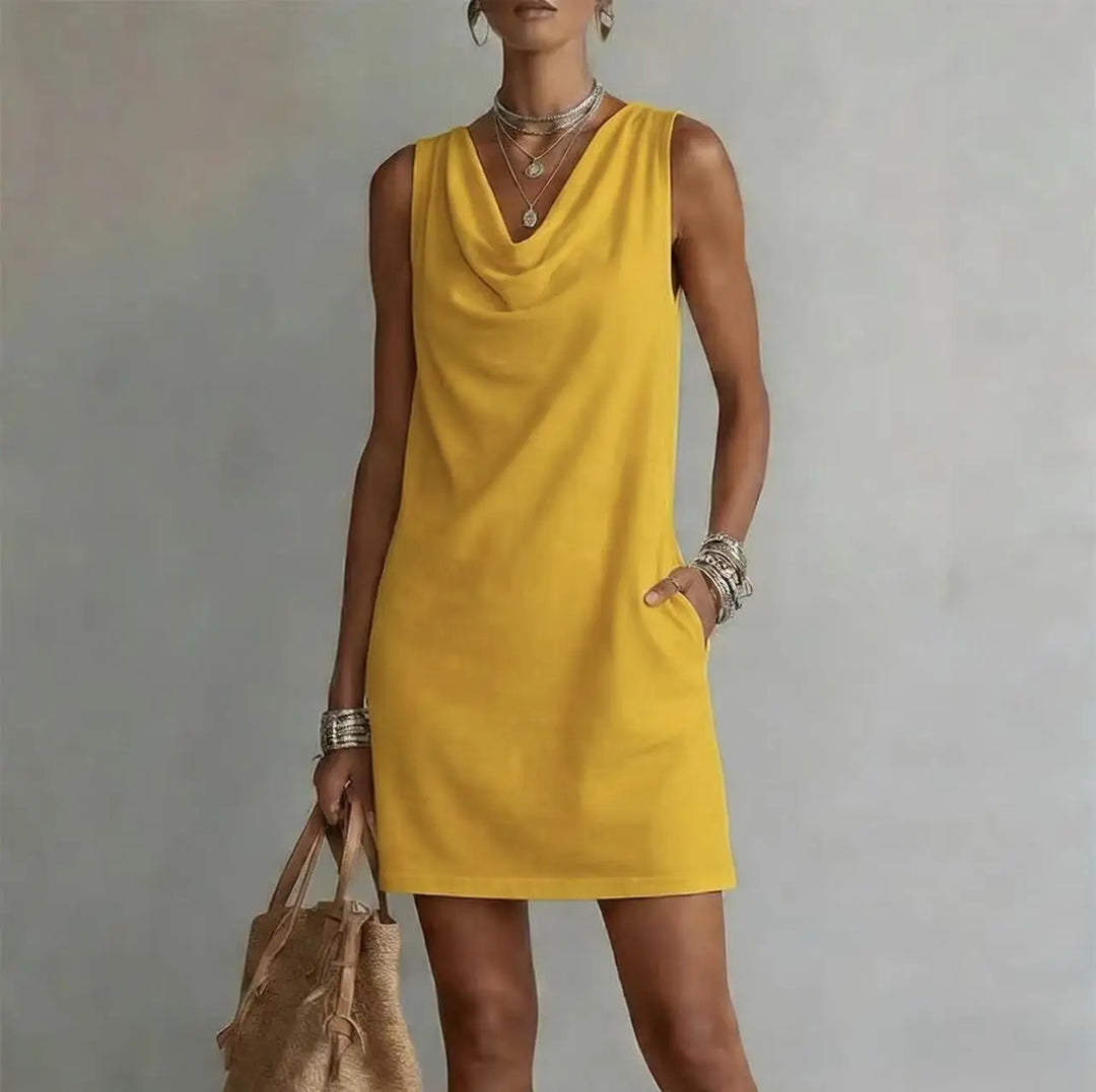 Smart casual women's A-line mini dress with a chic cowl neck and sleeveless design. A versatile summer staple.