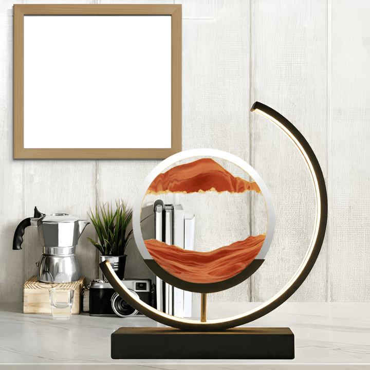 Relaxing desktop moving sand art display with integrated dimmable LED light, enhancing any living space.
