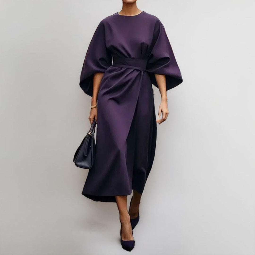 Chic women's long batwing maxi dress with a smooth satin feel, offering sophisticated women's fashion.