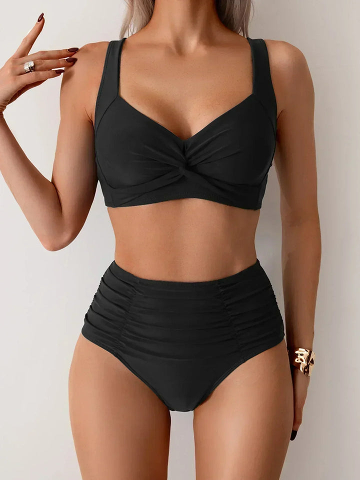 Elegant two-piece women's strapless bandeau bikini for stylish swimwear, perfect for a summer holiday.