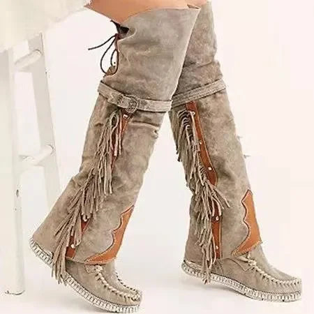 Chic women's knee-high fashion boots, offering a stylish and elegant look for versatile fall fashion.