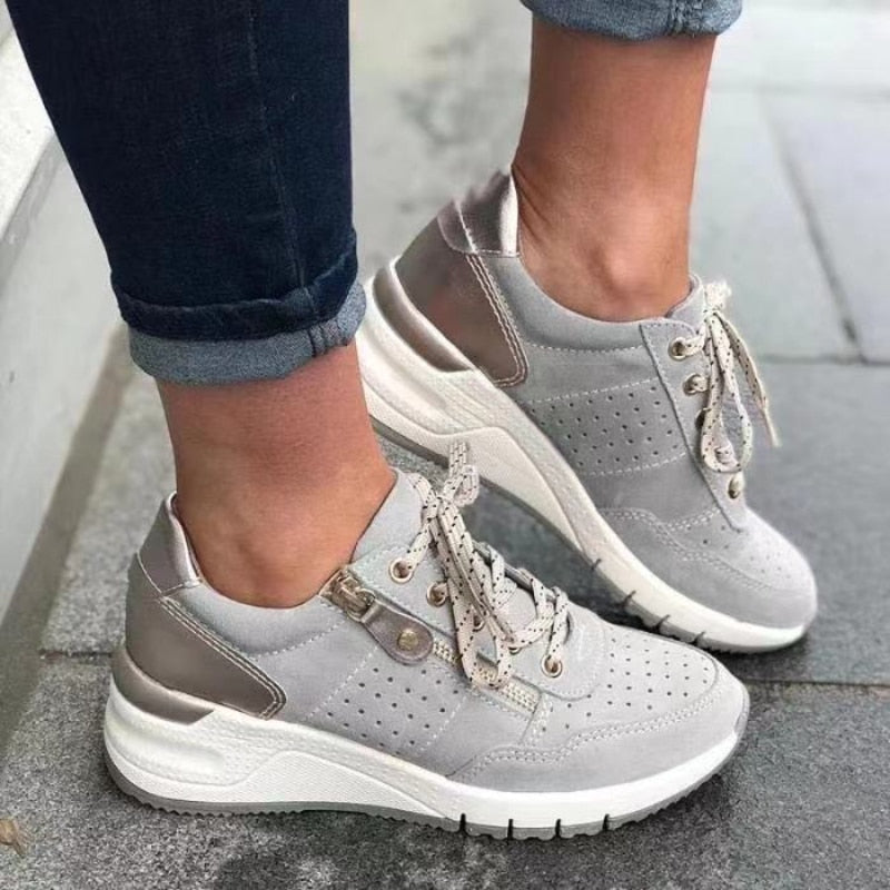 Easy-wear women's platform wedge walking sneakers, featuring both lace-up and side zip.