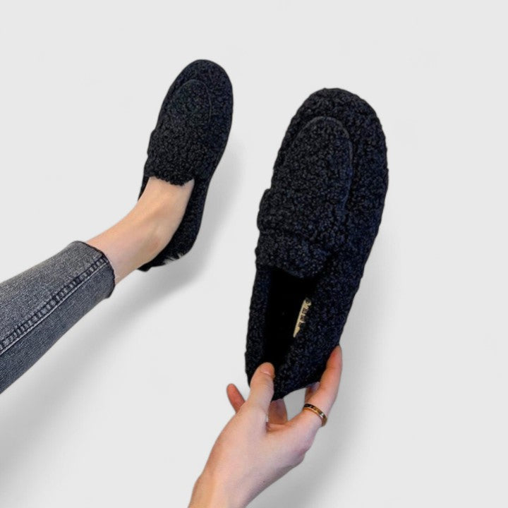 Women's elegant comfort slippers. Warm, cozy home footwear with non-slip sole, ideal for indoor winter use.