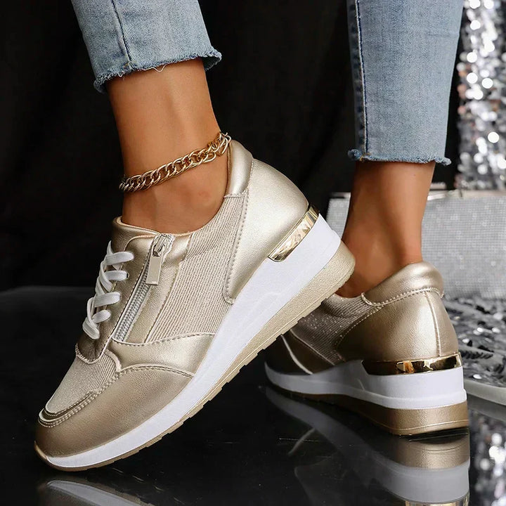 Gold metallic platform trainers for women, orthopaedic support with easy side zip and lace-up closure.
