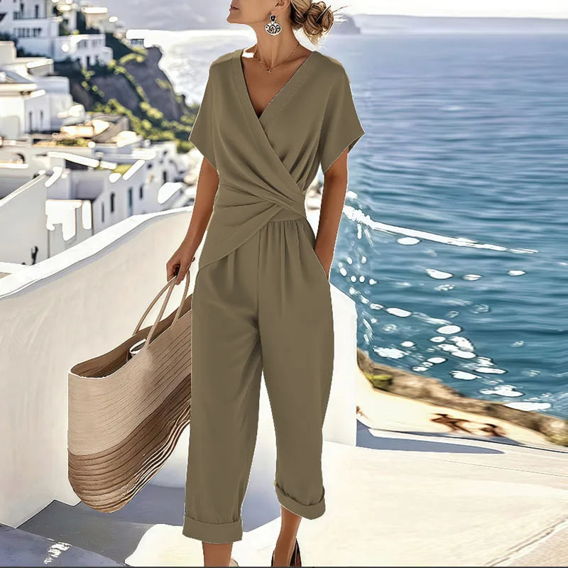 Women's chic two-piece set featuring a sophisticated wrap top and fashionable cropped pants for a versatile summer look.