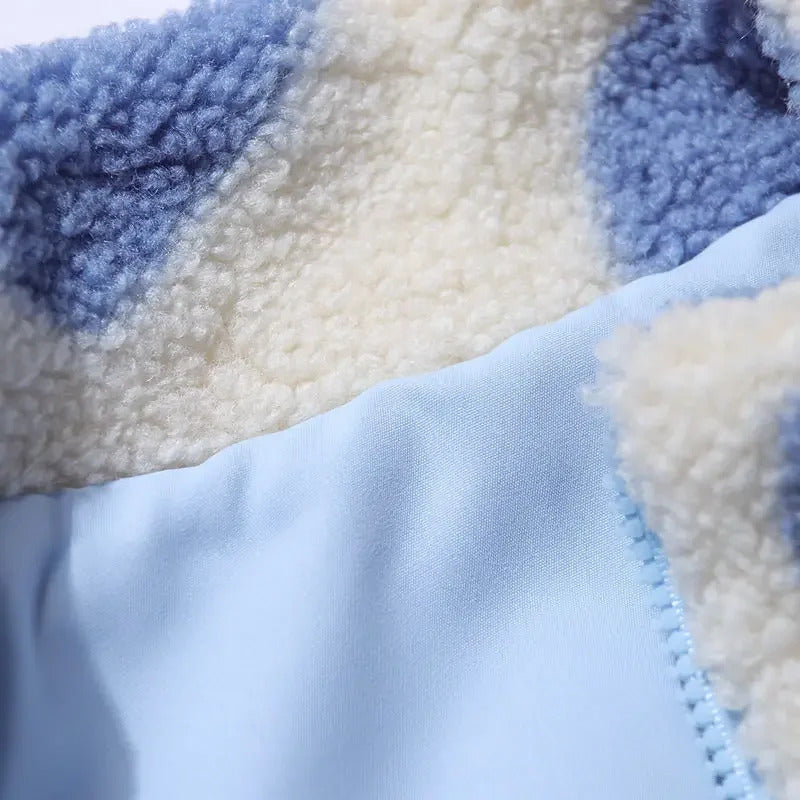 Chic women's reversible jacket, showing off a delicate heart detail. Lightweight and cozy for everyday wear.