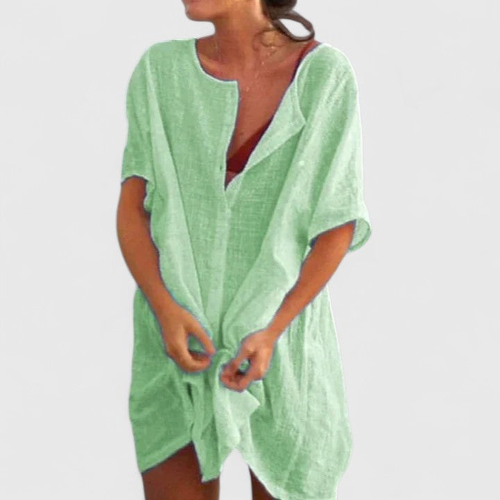 Versatile women's tunic dress styled for multiple looks, from casual beachwear to elegant evening summer wear. Fashion.