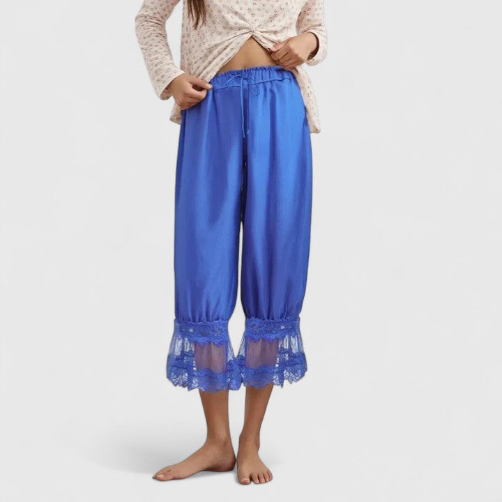 Elegant women's mid-rise trousers, blending stylish patchwork with a relaxed, comfortable fit.