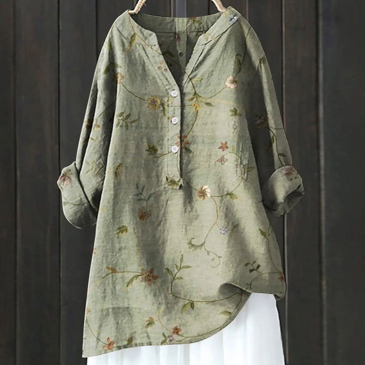 Vibrant floral print women's blouse, casual V-neck top for elegant spring/summer style.