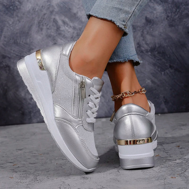 Women's orthopaedic platform trainers with a convenient side zip and lace-up design for comfort.
