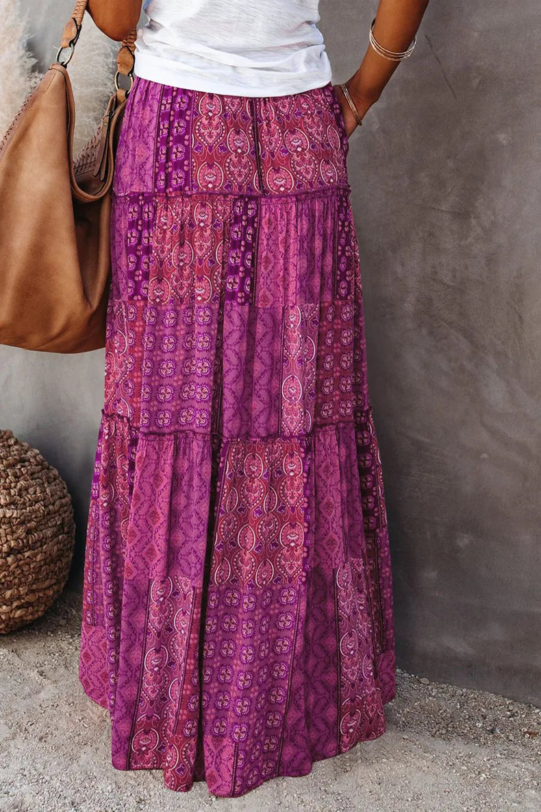 Women's elegant floral A-line maxi skirt, high-waisted design enhancing summer style.