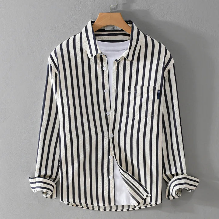 Versatile men's striped long sleeve shirt, button-front design for a smart casual look or workwear fashion.