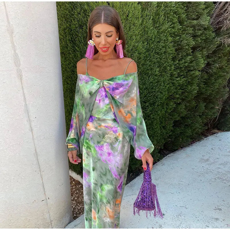 Women's sexy halter tie-dye maxi dress with a colorful print & removable bow, perfect for summer beach vacations.