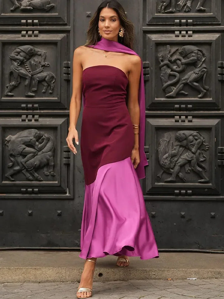 Elegant two-tone strapless women's dress with a flowing flounce skirt and coordinating shawl for formal events.