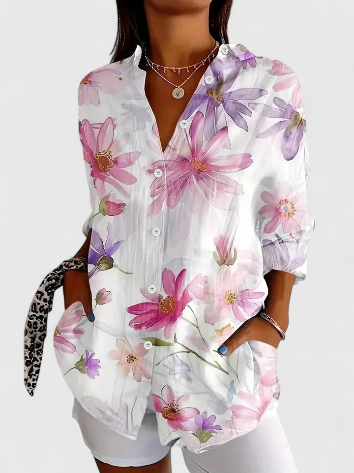Detailed floral print women's blouse, bringing a touch of spring & summer elegance to your versatile wardrobe.