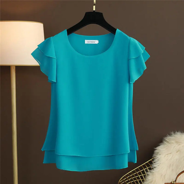 Stylish women's short sleeve blouse with O-neck, a versatile top for casual chic summer outfits.