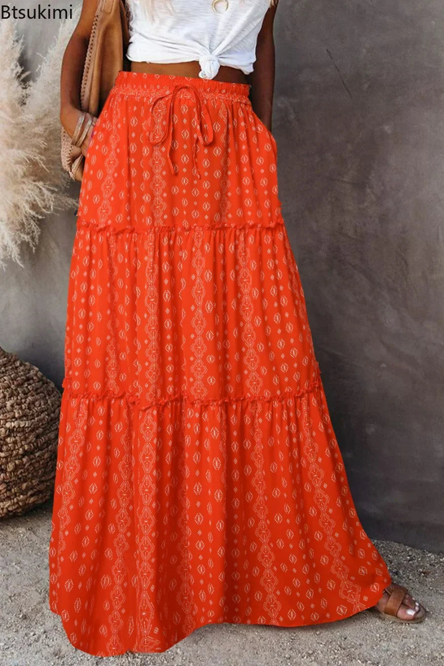 Chic women's high-waisted floral print maxi skirt with an elegant A-line silhouette.
