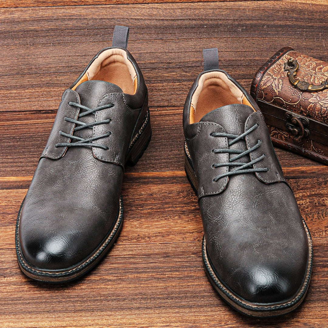 Comfortable men's dark grey booties, premium stylish footwear for everyday wear & non-slip grip.