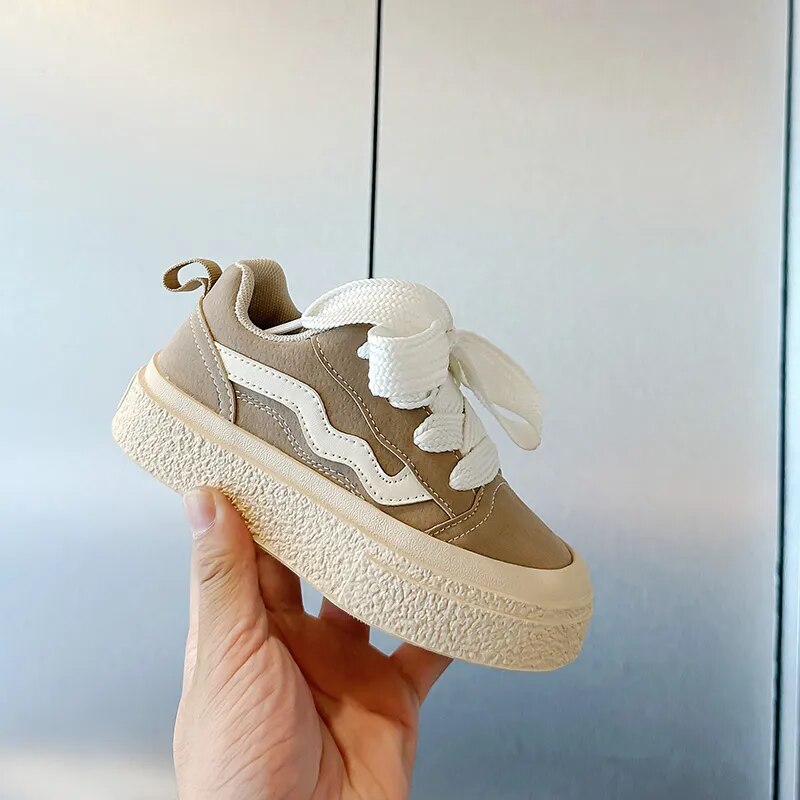 Stylish, colorful kids' sneakers with easy-wear design. Comfortable junior footwear for active children.