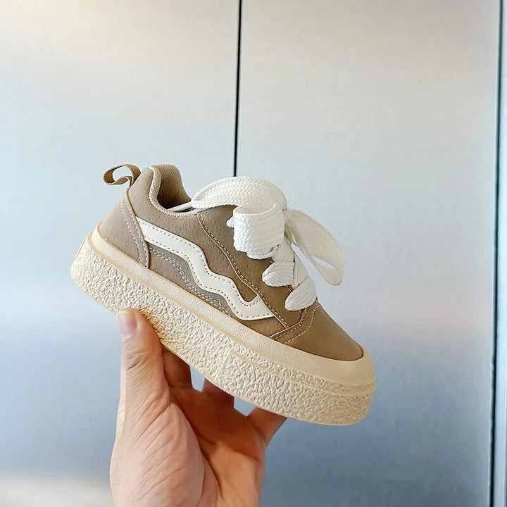 Stylish, colorful kids' sneakers with easy-wear design. Comfortable junior footwear for active children.
