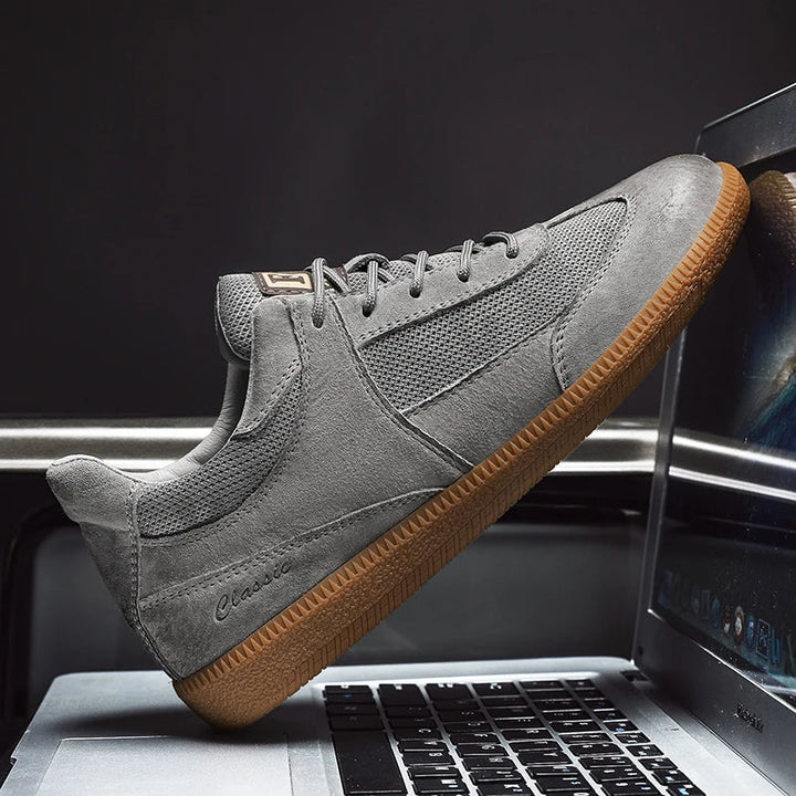 Rhys men's fashionable sneakers with sleek design, perfect for casual outings and comfortable all-day wear.