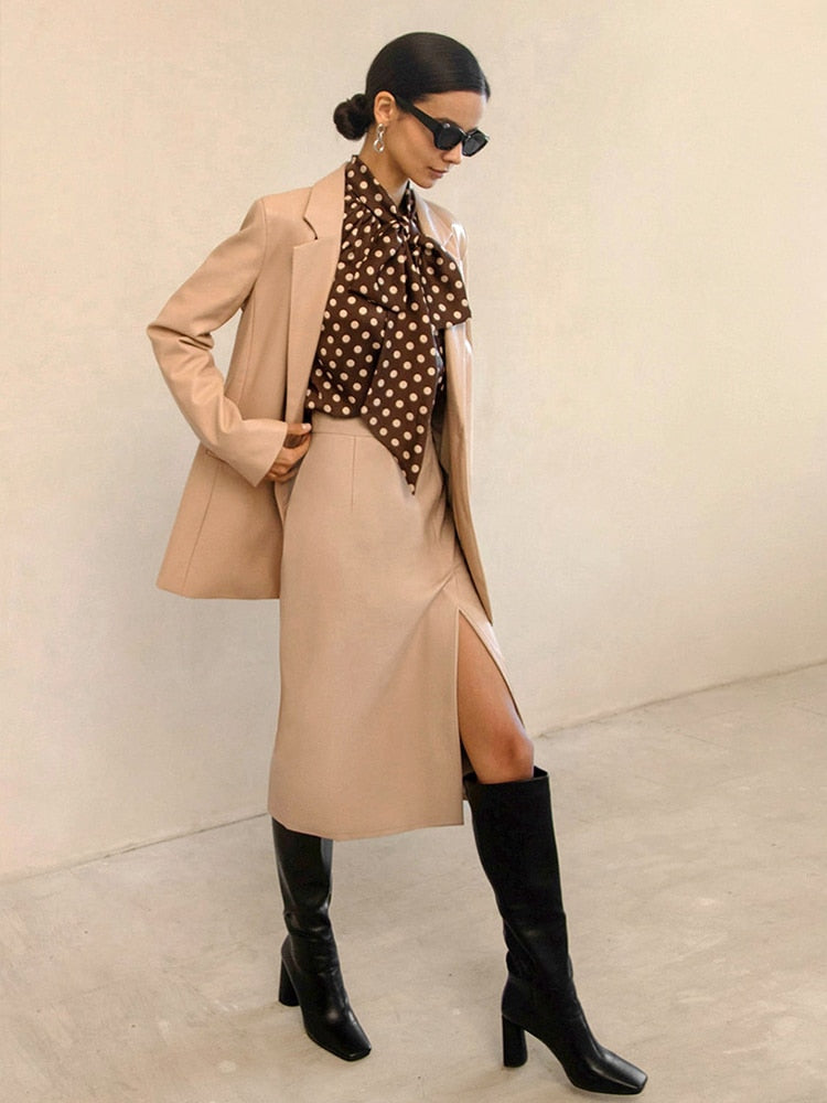 Versatile women's bodycon midi skirt with high waist & side slit, suitable for casual chic or office attire.