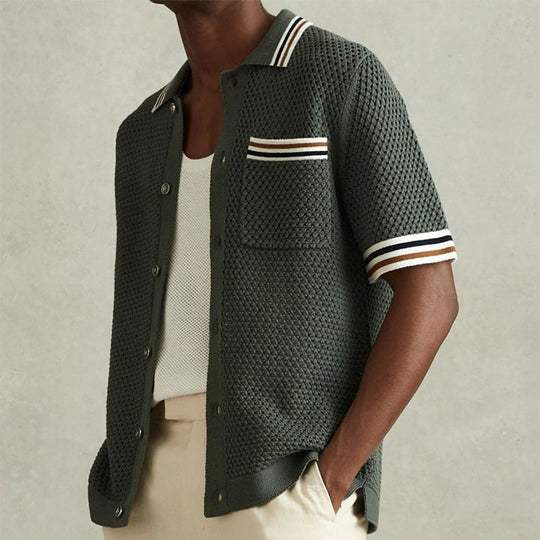 Comfortable men's short sleeve polo shirt, ideal for smart casual or everyday wear. Versatile textured top with buttons.