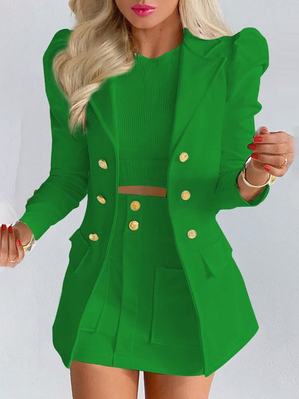 Close-up of the quality fabric and detailing on the women's elegant blazer and skirt matching set.