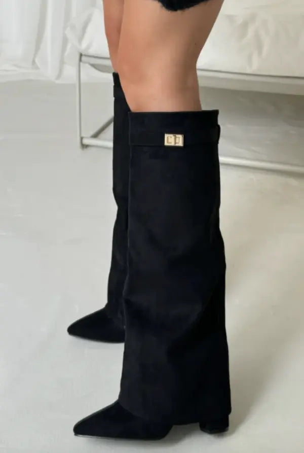 Versatile women's tall winter boots, providing elegant style and comfort in colder months.