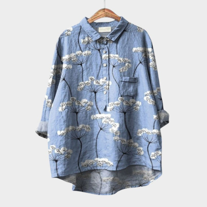 Elegant Women's Nola Collection printed long-sleeve blouse with a unique design, perfect for versatile fashion.