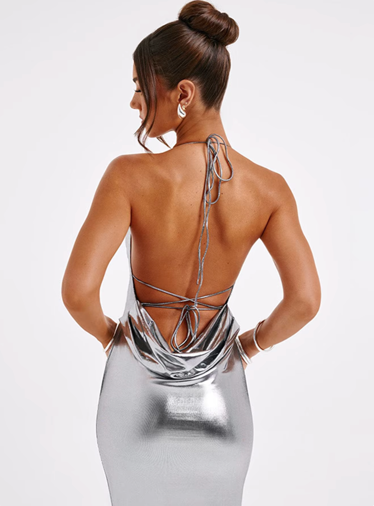 Luxe shimmering metallic maxi gown for women. Elegant spaghetti strap design, ideal for evening glamour & parties.
