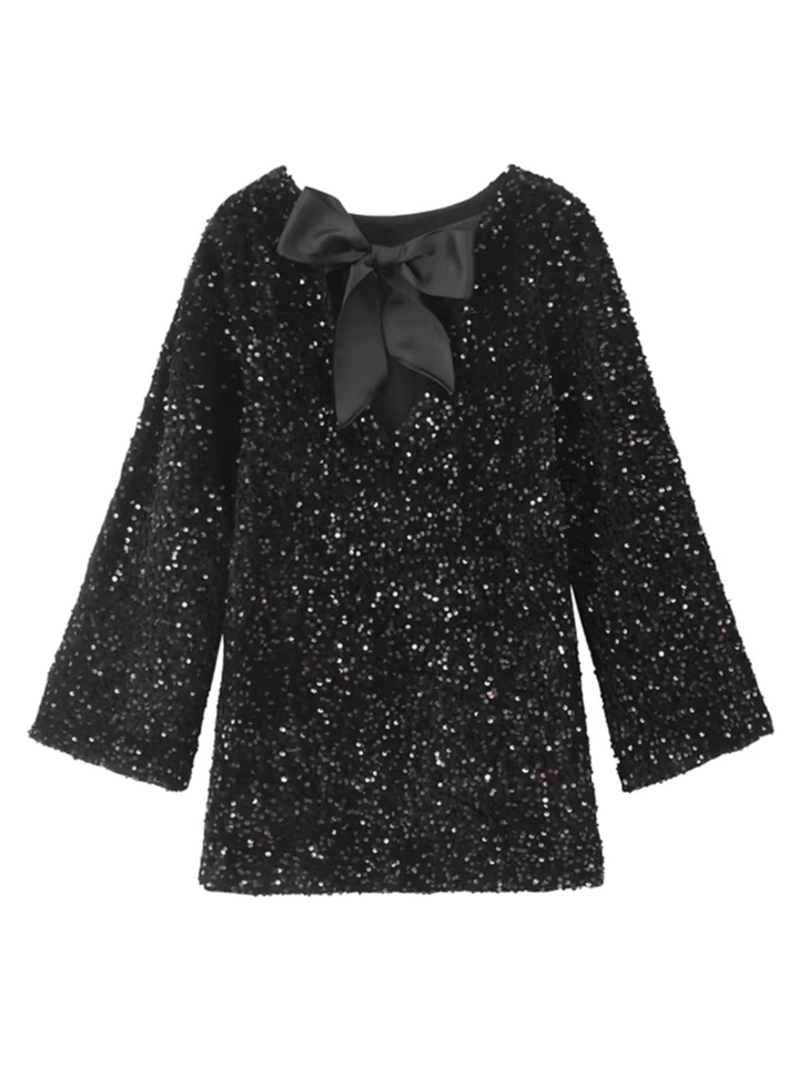 Dazzling sequin party dress, sleeveless, featuring elegant back bow. Ideal for glamorous night outs.