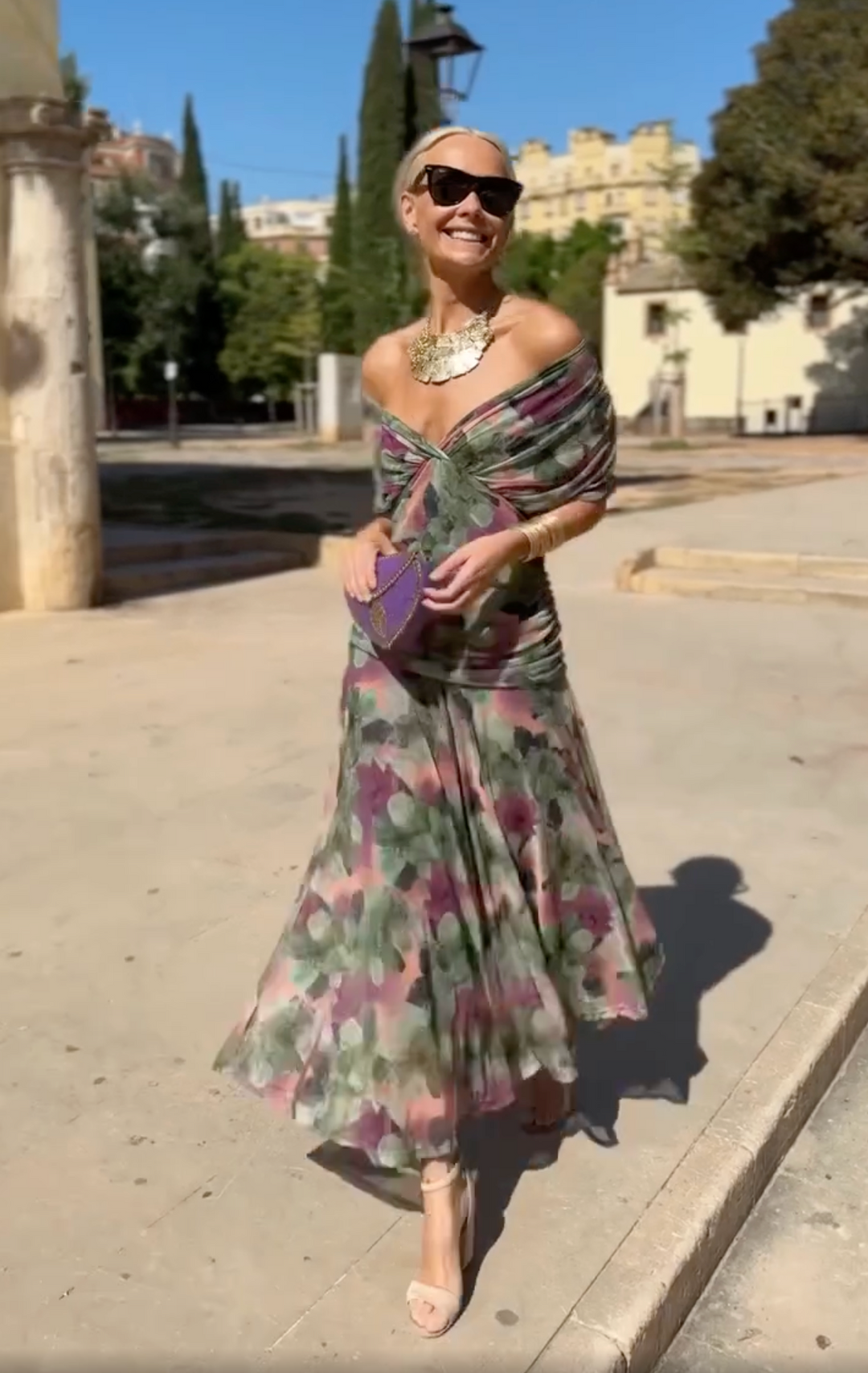 Elegant women's fashion: off-shoulder floral pleated midi dress, perfect for stylish summer parties & events.