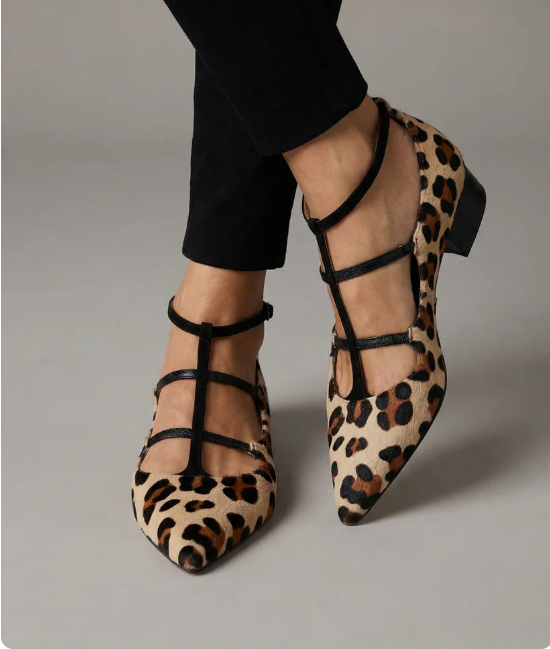 Fashionable women's dress heels featuring a sophisticated leopard strap, ideal for evening or office.