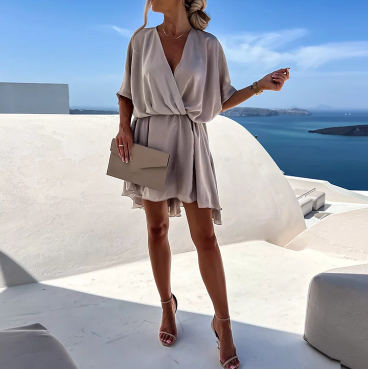 Elegant khaki women's midi dress, versatile for spring events or casual chic summer style.