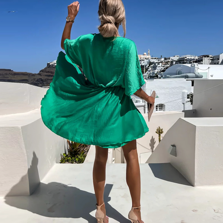 Green women's midi dress, a versatile summer dress for casual chic, spring, or holiday outfits.