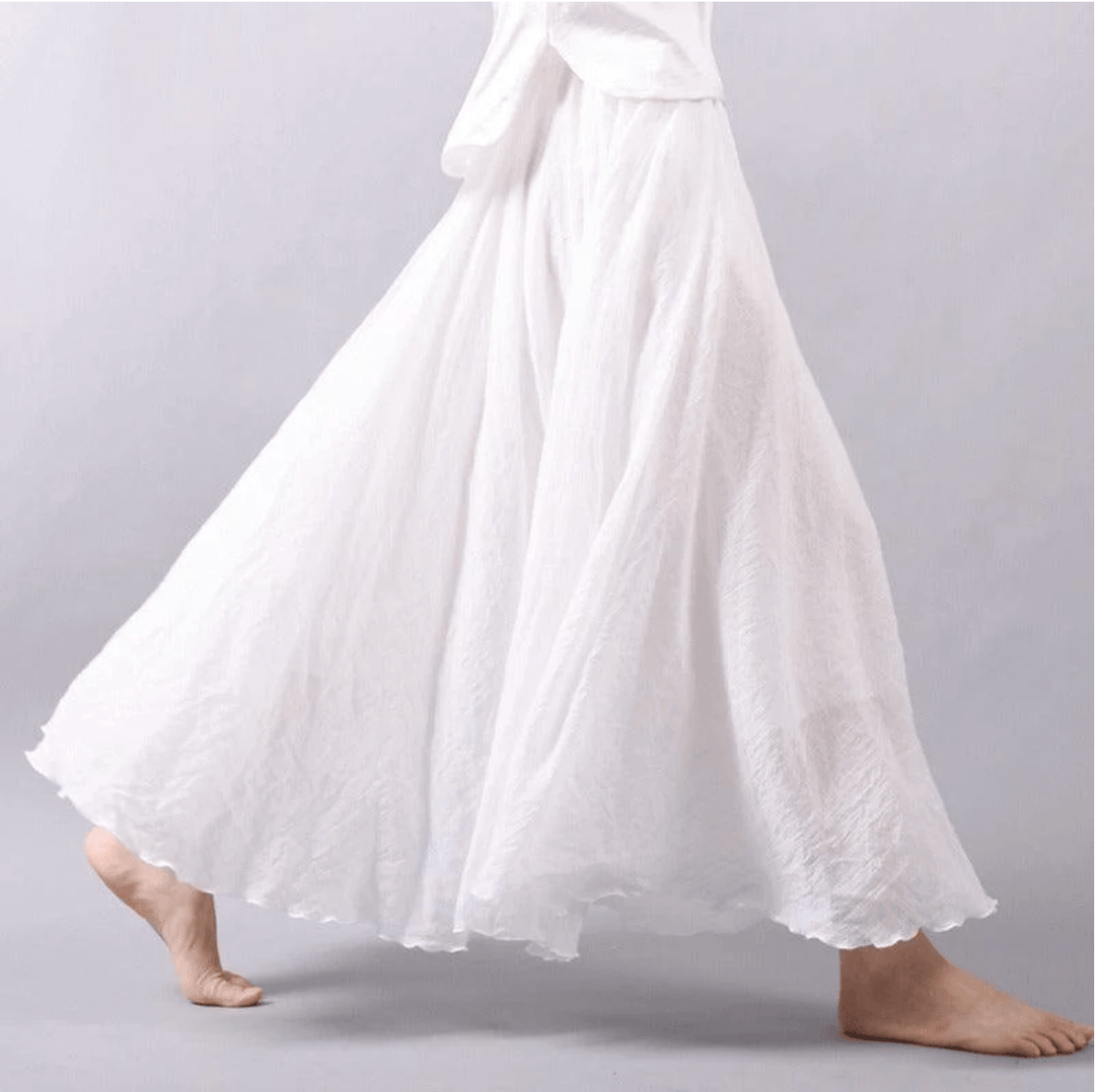 Blue flowy maxi skirt for women, ideal for bohemian beach fashion & elegant casual summer outfits. Comfortable style.