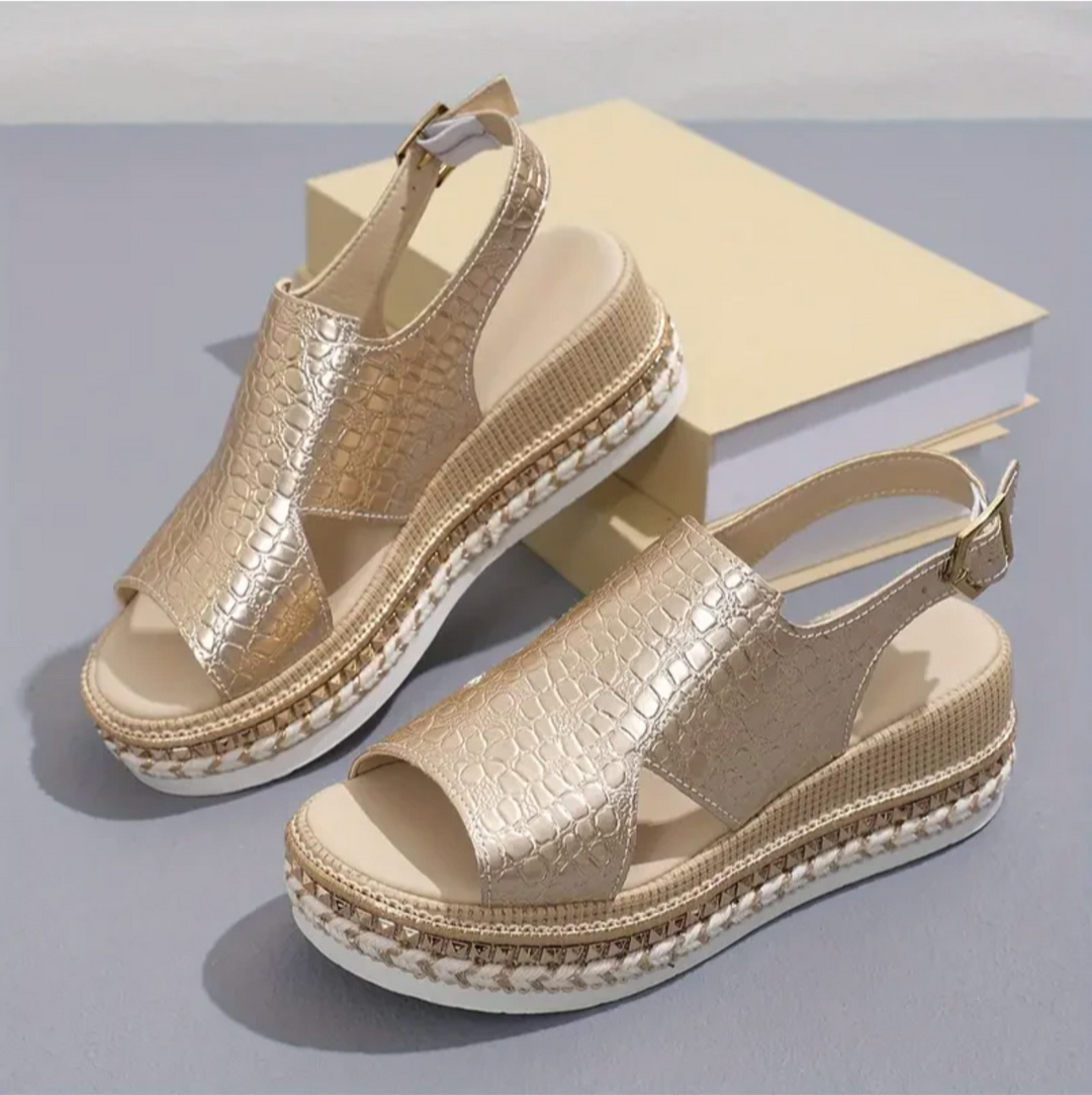 Comfortable silver orthopedic sandals for women with arch support, wide fit, and essential foot health.