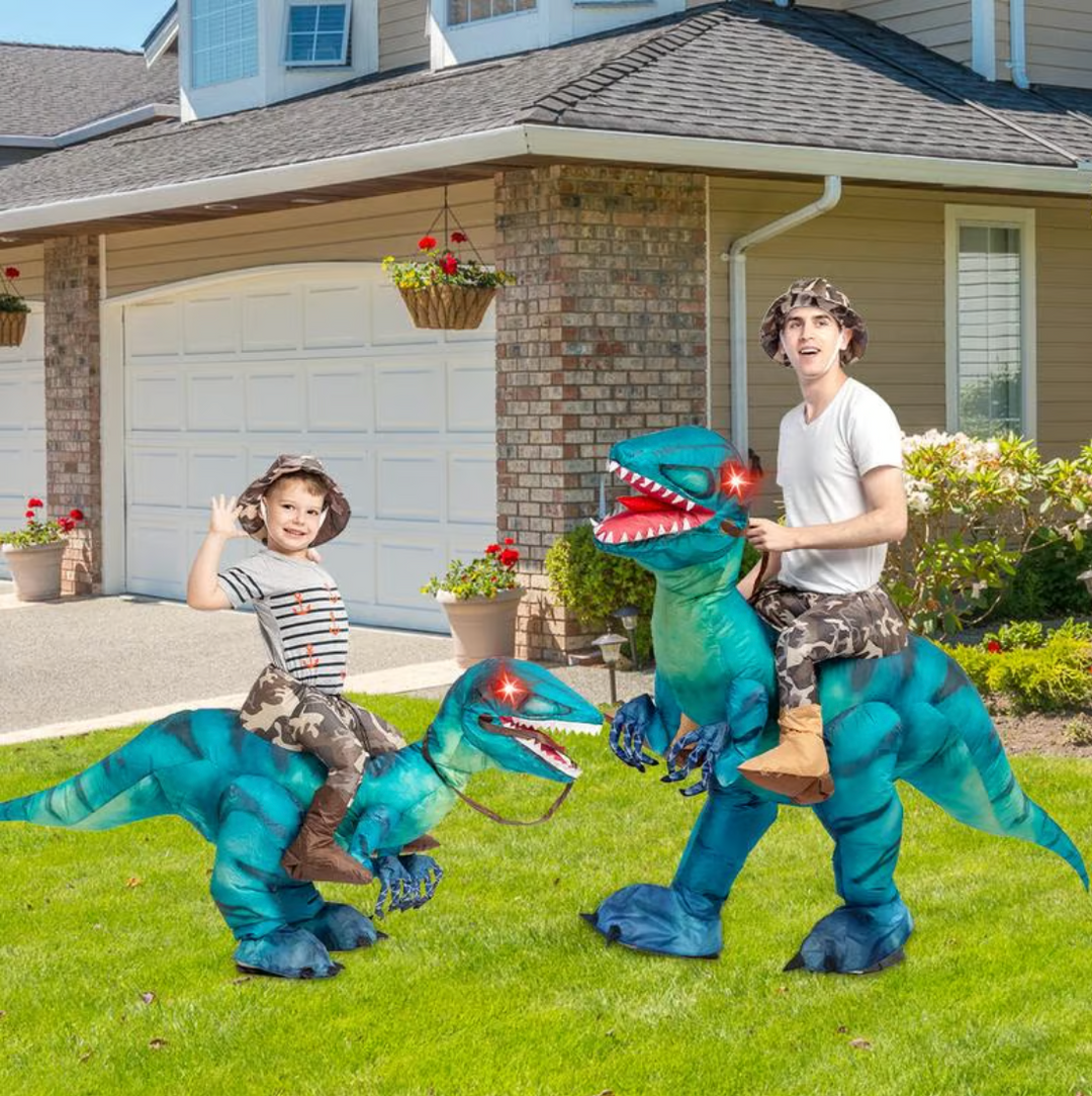 Adults enjoying a unisex inflatable dino ride-on toy. Ideal for parties, family games, & exciting outdoor play.