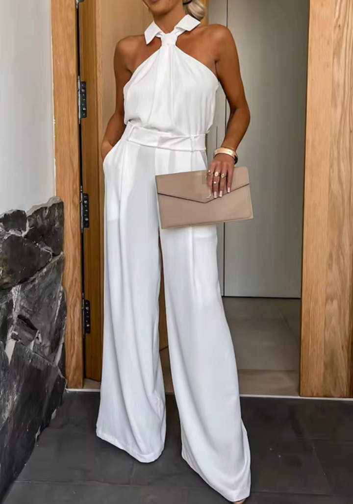 Women's elegant black jumpsuit, perfect for evening wear or stylish spring fashion.