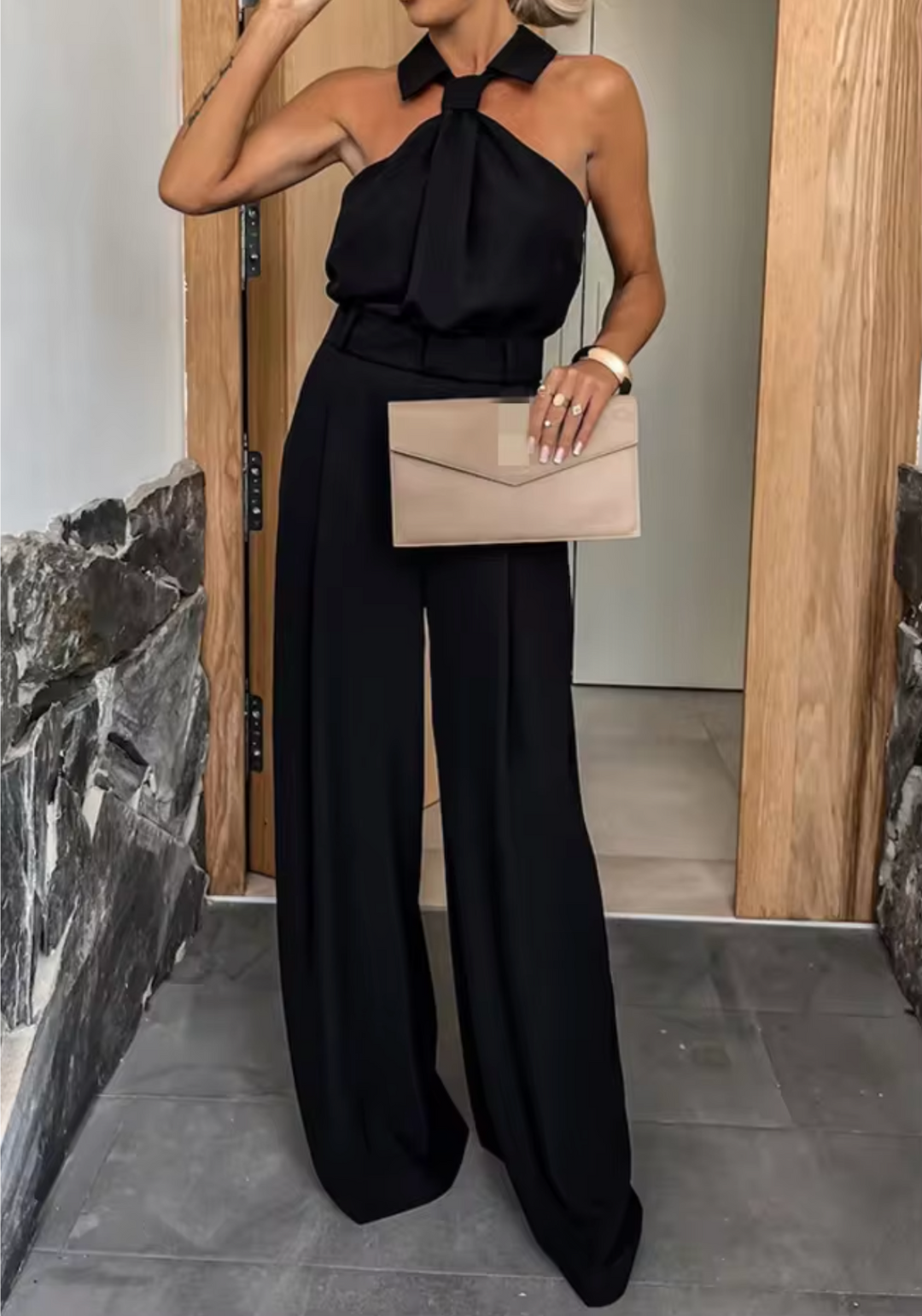 Elegant women's jumpsuit, a perfect choice for sophisticated evening wear or chic spring and summer fashion.